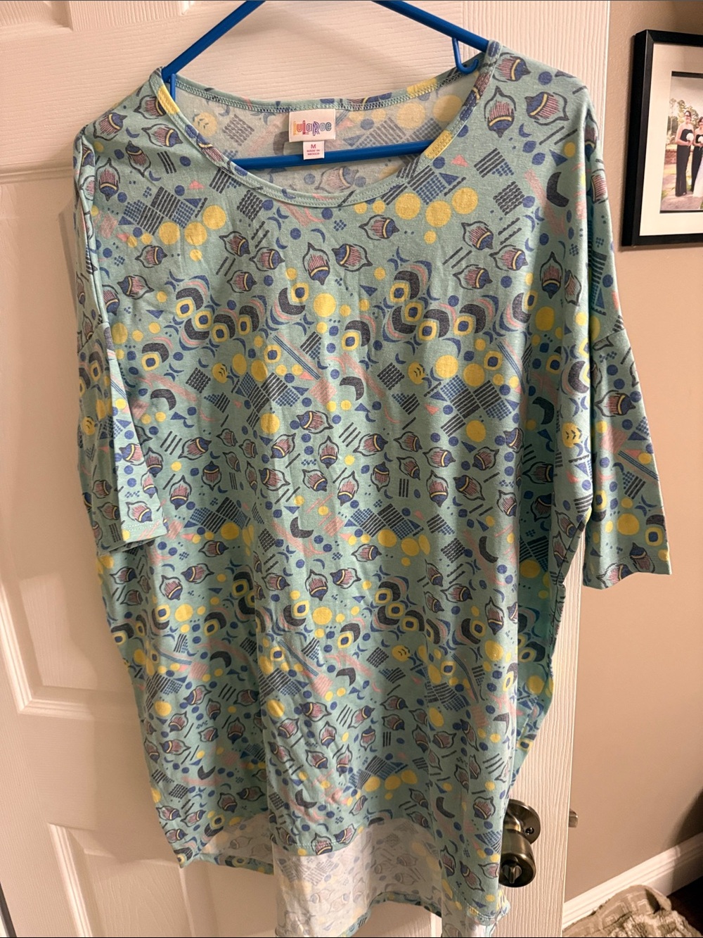 LuLaRoe Mint Green Short Sleeve Top with Yellow & Purple Accents